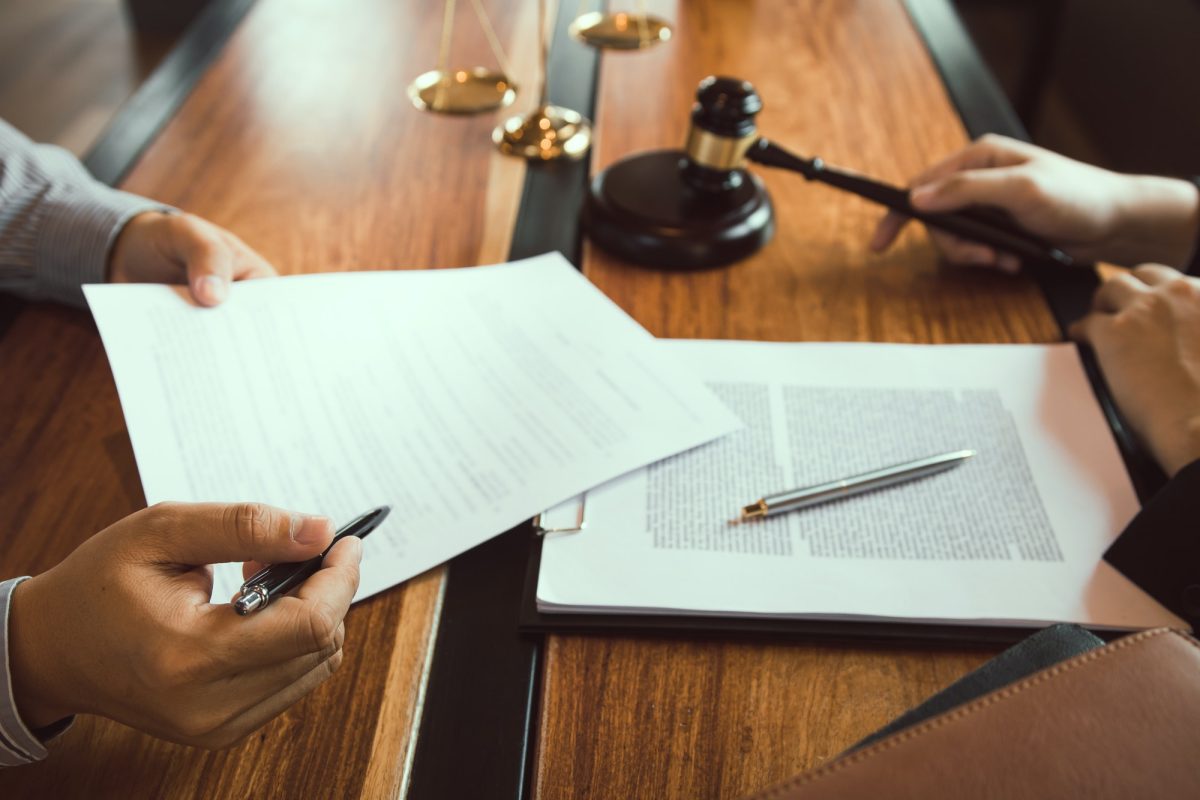 client-is-bringing-the-documents-to-clarify-the-law-to-the-lawyer-at-the-prosecutor-office-.jpg